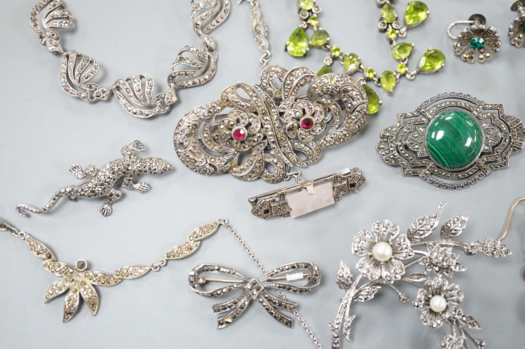 A small collection of assorted mainly white metal and marcasite set jewellery, including brooches, bracelet etc. and an enamelled RAF brooch.